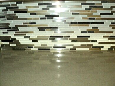 Great new glass and stone backsplash!