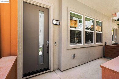 Entrance to property with stucco siding