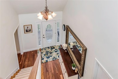 Light and bright double entry foyer.