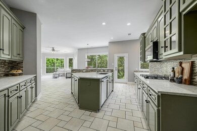 Designed with the home chef in mind, this kitchen is both highly practical and visually striking.