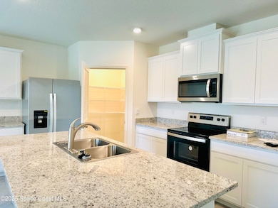 1256 Dugan Cir SE, Palm Bay, FL 32909 - photo 5