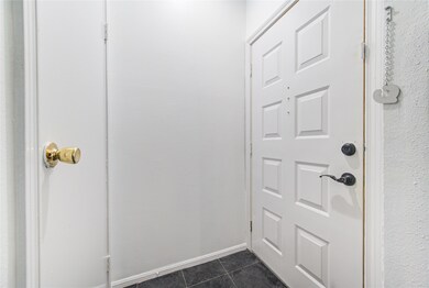 This image shows a clean, white interior entryway