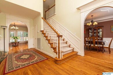 Gleaming Hardwood Floors & Beautiful Arched Doorways!