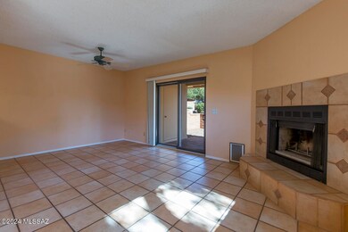 Living area with fireplace and backdoor