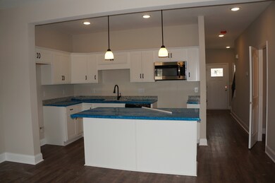 Our most Popular choice of cabinet color is  our White Cabinets.  Stainless Steel Appliances include Side by Side Refrigerator, Range, Microwave and Dishwasher.