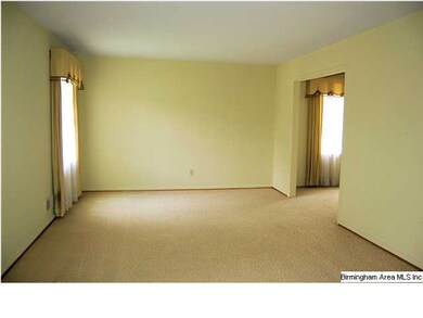 Partially carpeted, this home has hardwood floors 