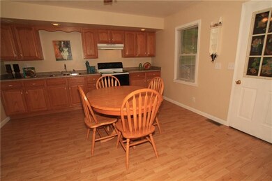 Another angle of the spacious eat in kitchen.