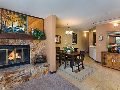 Dining Room. The fireplace warms the living, dinin