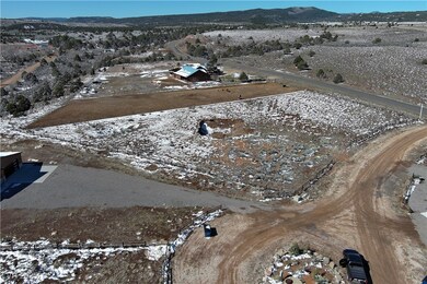 Aerial view of property and surrounding area featu
