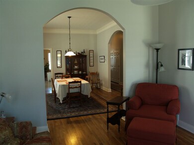 Living room looking into dining room.