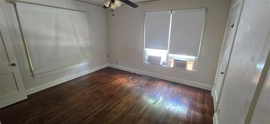 Spare room with dark wood finished floors, ceilin