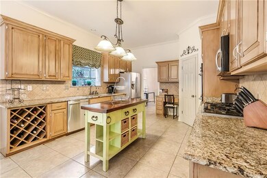 KITCHEN HAS GRANITE COUNTERS, STAINLESS APPLIANCES
