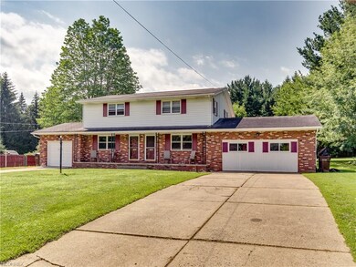 This home has three total driveways, two in the fr
