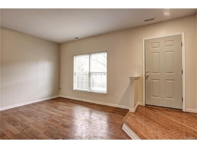 Spacious living room/ family room has double windo