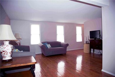 Living room offers many seating/entertainment opti