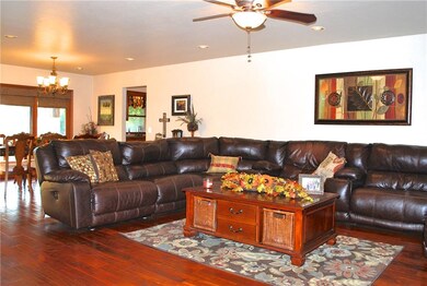 As you enter the home, this large living area welc