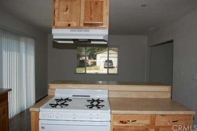 The gas range and hood are 1-year new, too. While 
