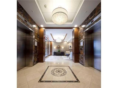 Lobby/Reception. Condo lobby has 2 elevators exclu