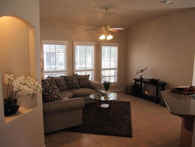 from the foyer. Plantation shutters throughout!