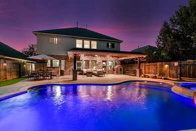 Gorgeous view of your backyard oasis and amazing patio deck!