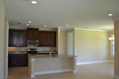 View from great room of this spacious and practical kitchen and eating area.