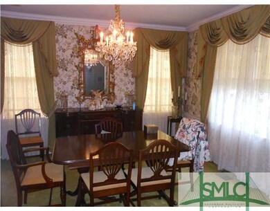 Dining Room. Large Windows Classic Chandelier