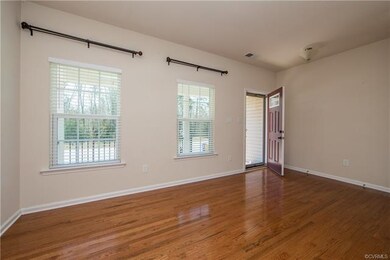 This room will accommodate any style decor.