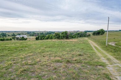 View of yard with a rural view