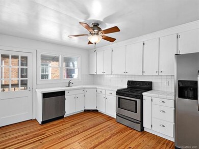 Kitchen with eat-in space and access to a side deck