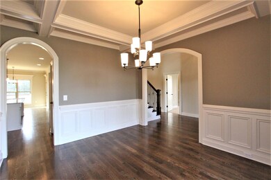 Formal Dining Room With Access To Kitchen