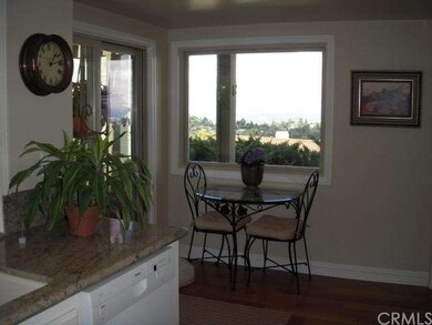 Kitchen eat-in area with view and patio access