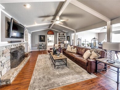 Large living area with vaulted ceilings and charmi