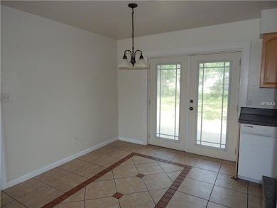 Dining Room with Decorative Ceramic Tile