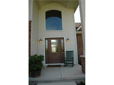 Exterior Front Two-story Entrance