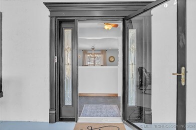 Stunning front door welcomes you as well as a glas