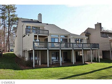 Exterior Front - Rear view with yard, water views 