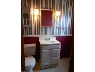 Private half bath off master bedroom has a large c
