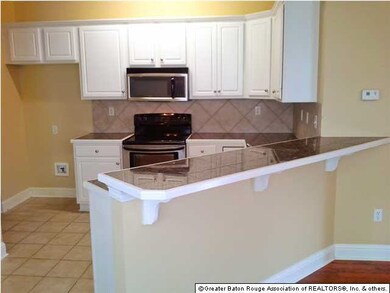 Convenient kitchen with s/s appliances, pantry and
