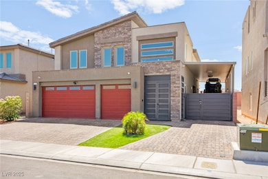 View of front of home with stucco siding, an attac