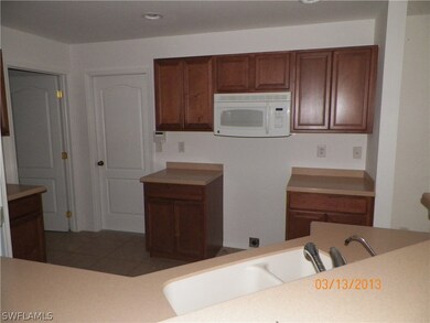 Kitchen, garage door on right/ laundry room door o