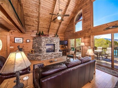 Massive stone fireplace with room to sit around th