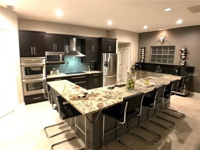 Large open kitchen with walk in pantry