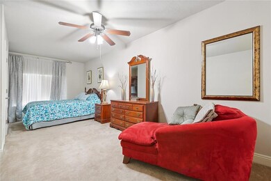 Upstairs bedroom with reading chair.