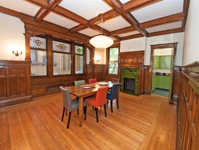 Wonderful dining room with coffered ceiling and wa