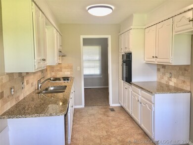 Kitchen is light and Bright all new Granite Counte