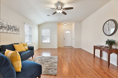 Spacious living room greets you as you walk in!