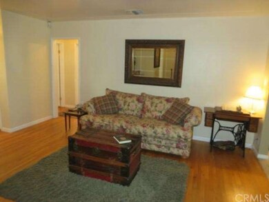 Living room with hardwood flooring