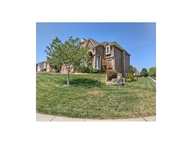 Gorgeous corner lot offers great landscaping and w