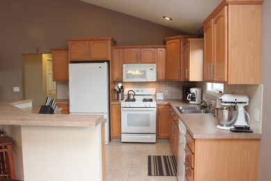 1141 Woodspointe Dr SW, Byron Center, MI 49315 - photo 4