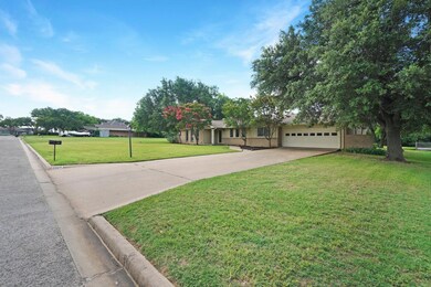 View of front of property with a front yard and a 